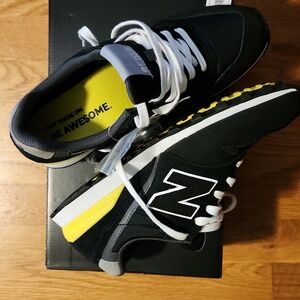 Figs New Balance Womens 9 Black and white with Yellow accents